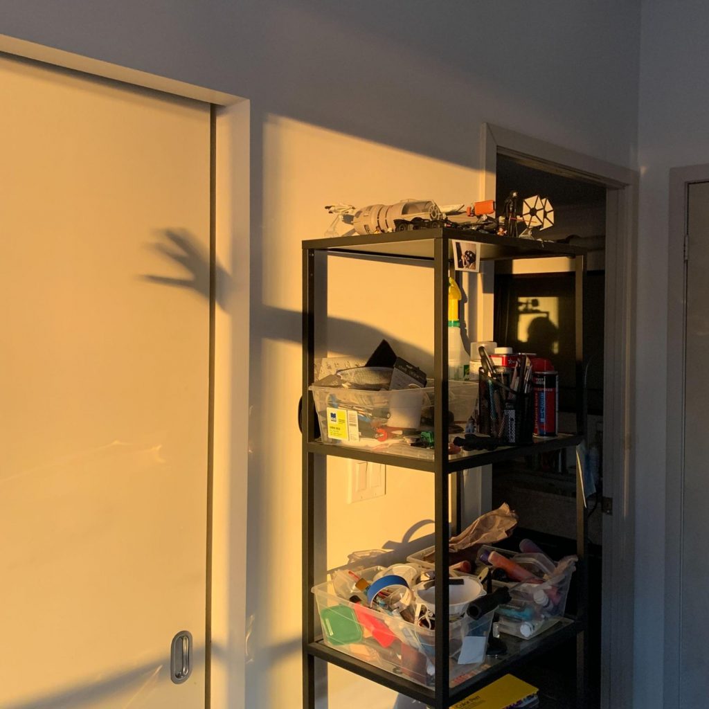 Shelf in the artist's workspace
